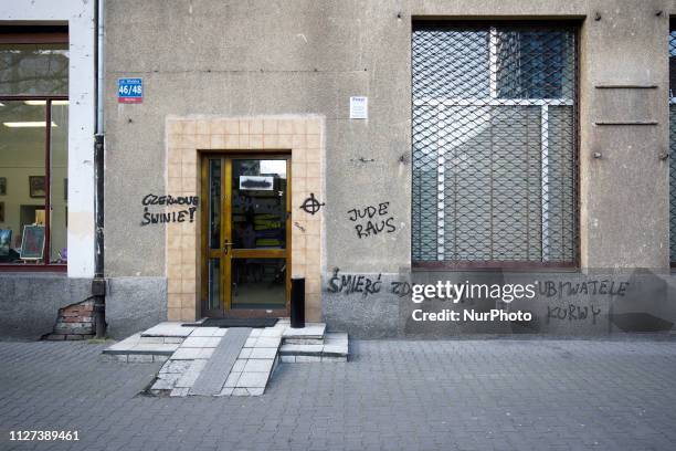 The office of the civic action committee Obywatele RP is seen besmirched with hate propaganda including anti-Semitic messages and white power symbols...