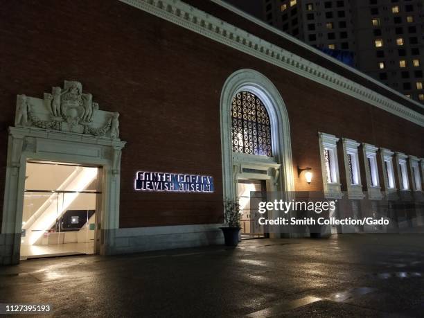 Night view of illuminated sign at the Contemporary Jewish Museum in San Francisco, California, February, 2019.