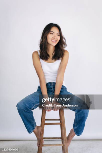 portrait of a young woman - tank top bildbanksfoton och bilder