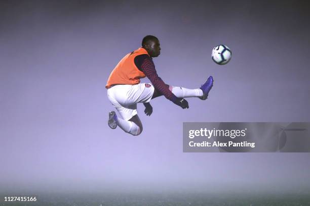 Jordi Osei-Tutu of Arsenal warms up ahead of the Premier League 2 match between Arsenal and West Ham at Meadow Park on February 04, 2019 in...