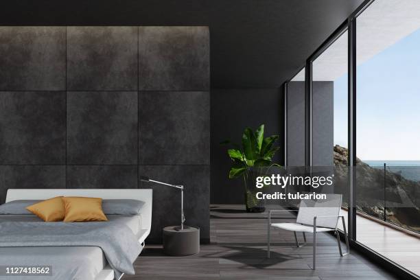 moderne luxuriöse schwarze schlafzimmer in einer villa am meer - besuch zuhause sommerlich innenaufnahme stock-fotos und bilder