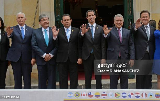 Vice President Mike Pence, Colombia's Foreign Minister Carlos Holmes Trujillo, Guatemalan President Jimmy Morales, Venezuelan opposition leader and...