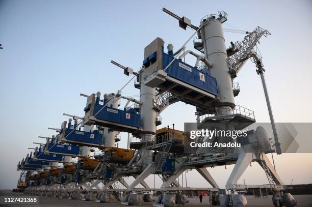 Officials attend an inauguration ceremony for the first export convoy to India via Iran at Chabahar seaport in Chabahar, Iran on February 25, 2019....