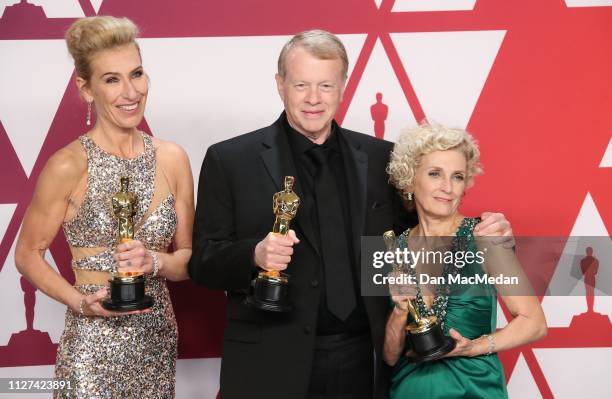 Kate Biscoe, Greg Cannom and Patricia Dehaney, winners of Best Makeup and Hairstyling for 'Vice,' pose in the press room at the 91st Annual Academy...