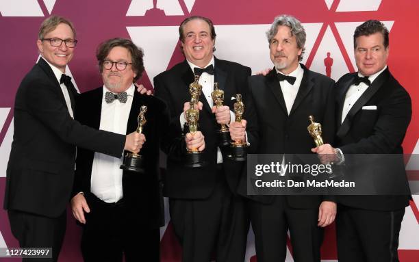 Jim Burke, Charles B. Wessler, Nick Vallelonga, Peter Farrelly, and Brian Currie, winners of Best Picture for 'Green Book,' pose in the press room at...