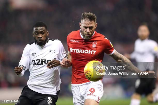 Fikayo Tomori of Derby County and Daryl Murphy of Nottingham Forest during the Sky Bet Championship match between Nottingham Forest and Derby County...