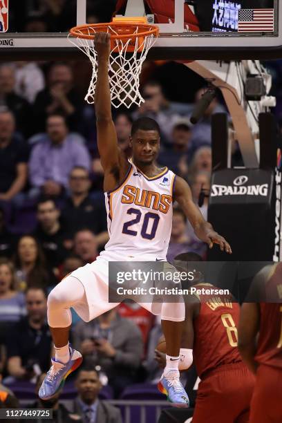 Josh Jackson of the Phoenix Suns reacts after slam dunking the ball against the Houston Rockets during the first half of the NBA game at Talking...