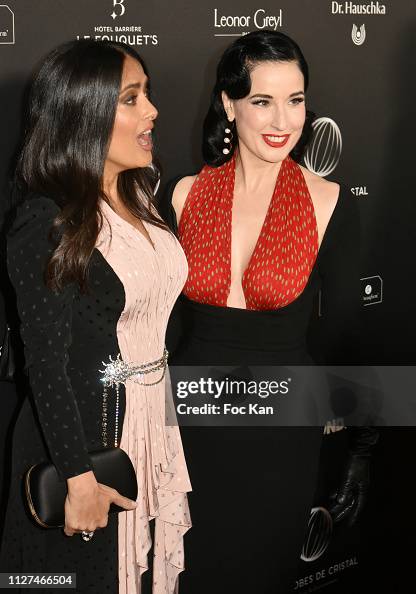 Salma Hayek and Dita von Teese attend the 14th "Globe De Cristal