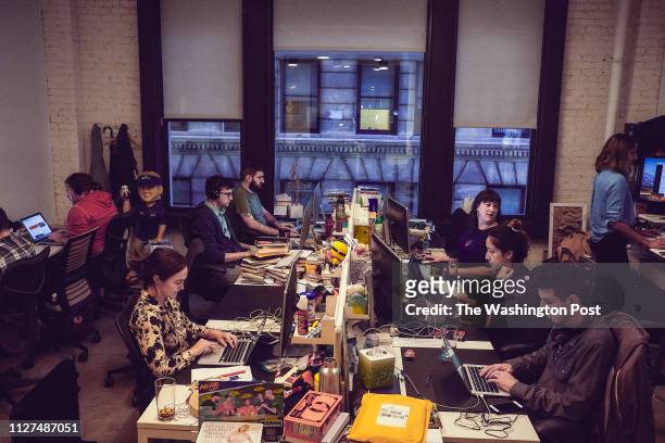 Employees from the website Deadspin work inside their office in Manhattan, New York on November 1, 2018.