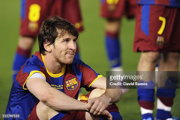 Lionel Messi of FC Barcelona looks on dejected after being defeated at the end of the Copa del Rey Final between Real Madrid and Barcelona at Estadio...