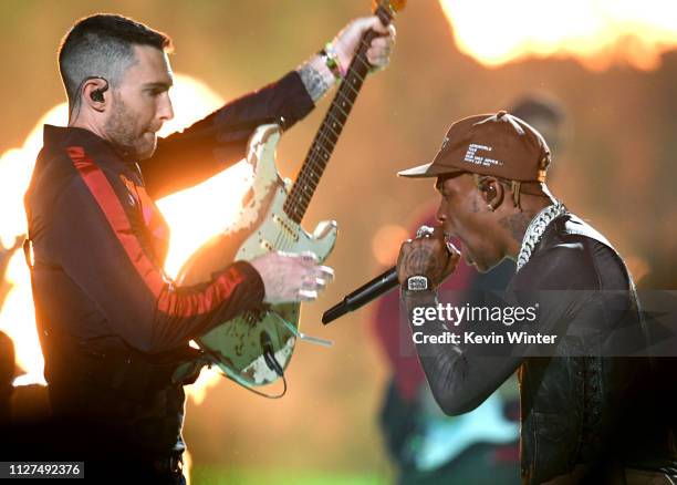 Adam Levine of Maroon 5 and Travis Scott perform during the Pepsi Super Bowl LIII Halftime Show at Mercedes-Benz Stadium on February 03, 2019 in...