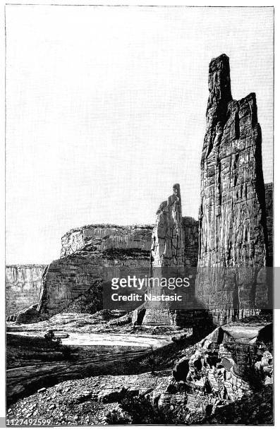 spider rock in canyon de chelly - sandstone stock illustrations
