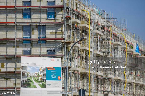 Berlin, Germany Symbolic photo on the subject of housing construction. Rough buildings of residential houses stand on a construction site in Berlin...