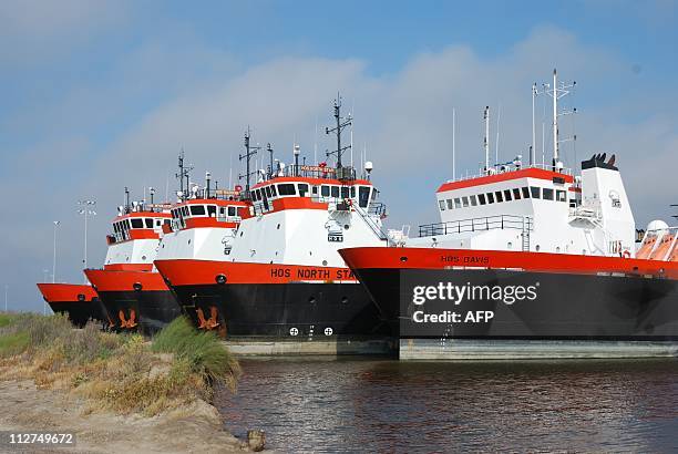 == With AFP Story by Mira OBERMAN: US-oil-pollution-environment-BP-drilling,FOCUS ==Ships which have been docked for months after a moratorium on...