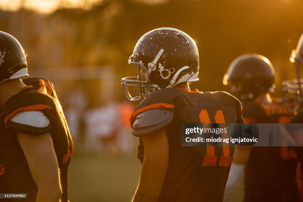 American Football Player Taking Time Out