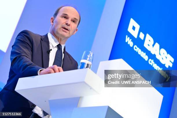 Martin Brudermueller, chairman of German chemicals giant BASF, gives a press conference to present his company's business report on February 26, 2019...