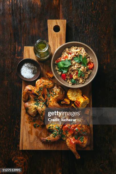 grilled whole butterflied chickens - rotisserie stock pictures, royalty-free photos & images