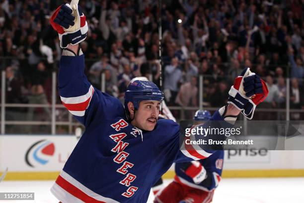 Brandon Dubinsky of the New York Rangers celebrates after he scored a goal in the second period against the Washington Capitals in Game Four of the...