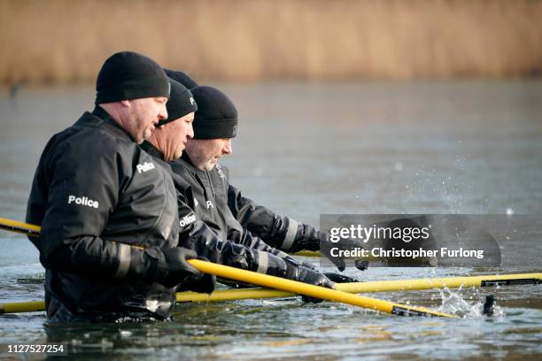 Police search the frozen Oak Road Pond in Hull near to the home of missing 21-year-old student Libby Squire on February 05, 2019 in Hull, England....