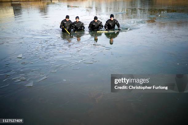 Police search the frozen Oak Road Pond in Hull near to the home of missing 21-year-old student Libby Squire on February 05, 2019 in Hull, England....