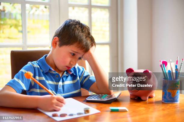 dyslexic  boy unable to struggling with counting - lernbehinderung stock-fotos und bilder