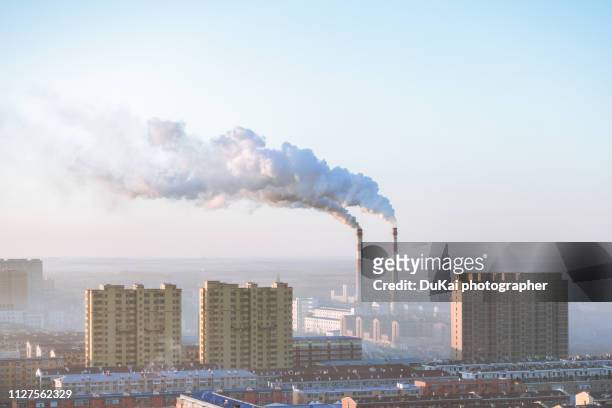 chimney in beijing - coal pollution stock pictures, royalty-free photos & images