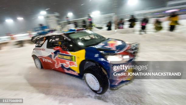 France's Sebastien Loeb and co-driver Monaco's Daniel Elena steer their Citroen DS3 during the first stage of the WRC Rally of Sweden, at the...