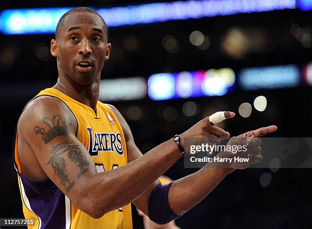 Kobe Bryant of the Los Angeles Lakers reacts in the first quarter while taking on the New Orleans Hornets in Game Two of the Western Conference...