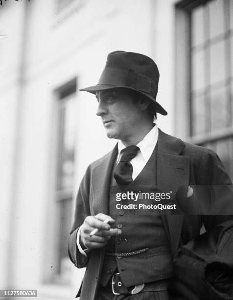 View of American actor John Barrymore as he smokes a cigarette during a visit to the White House , Washington DC, January 9, 1924.