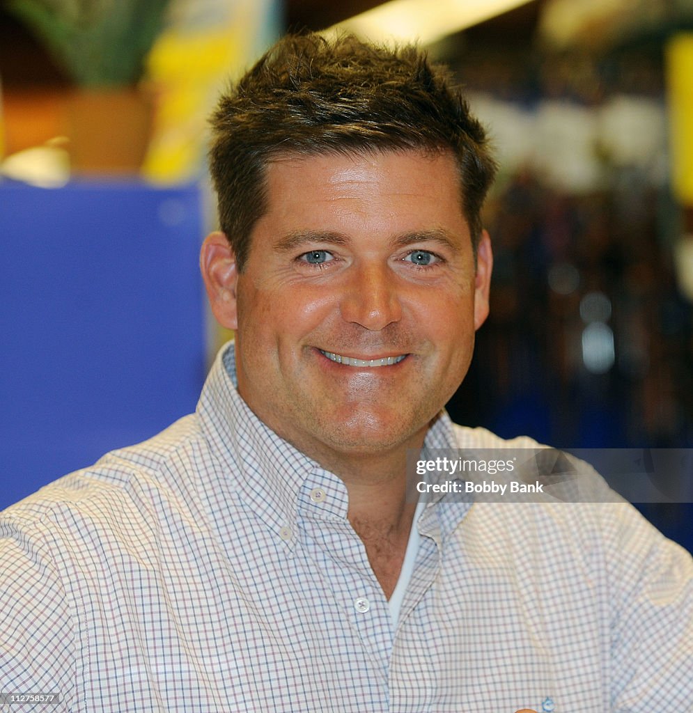Jamie Deen signs his new book "Deen Bros Get Fired Up" at Wegmans