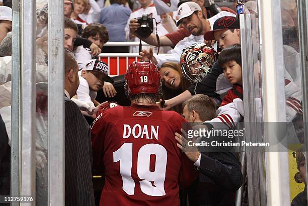 Shane Doan of the Phoenix Coyotes walks off the ice after being defeated by the Detroit Red Wings in Game Four of the Western Conference...