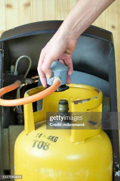lpg gas bottle, butane gas cylinders - lpg-installation stock pictures, royalty-free photos & images