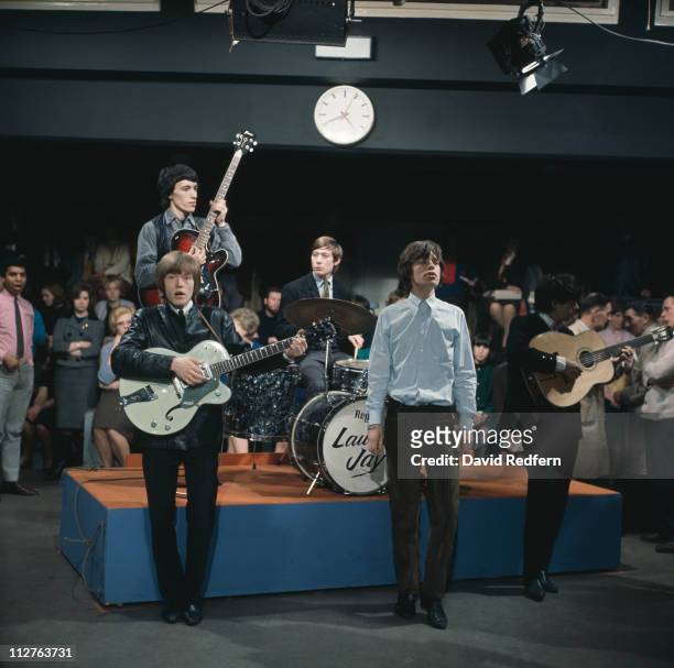 English rock and roll group The Rolling Stones, from left, guitarist Brian Jones , bassist Bill Wyman, drummer Charlie Watts, singer Mick Jagger and...