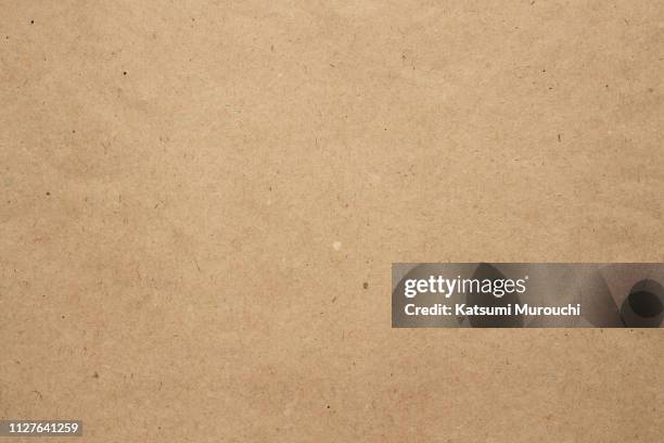 brown paper texture background - brown paper stock pictures, royalty-free photos & images