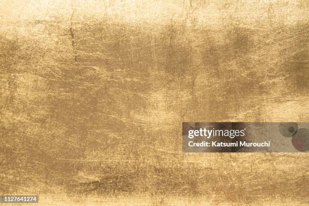 gold foil texture background - messing stock-fotos und bilder