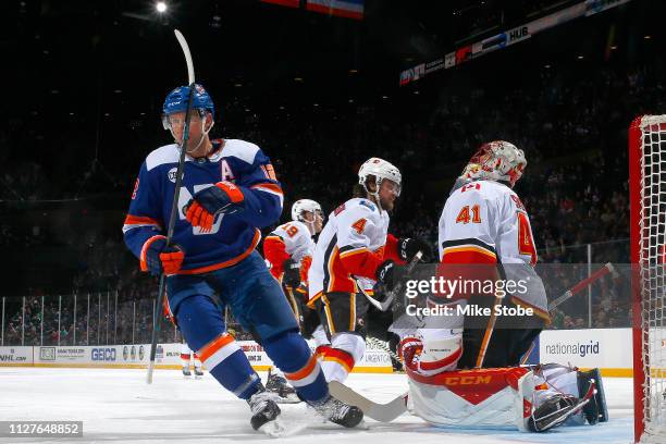 Josh Bailey of the New York Islanders celebrates his second period goal past Mike Smith of the Calgary Flames at NYCB Live's Nassau Coliseum on...