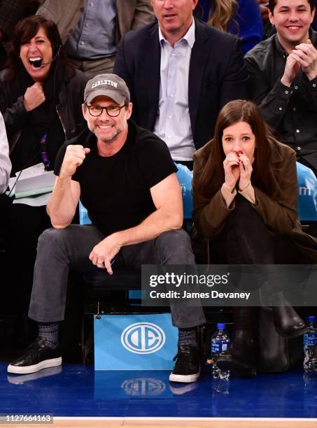 Christian Slater and Brittany Lopez attend Orlando Magic v New York Knicks game at Madison Square Garden on February 26, 2019 in New York City.