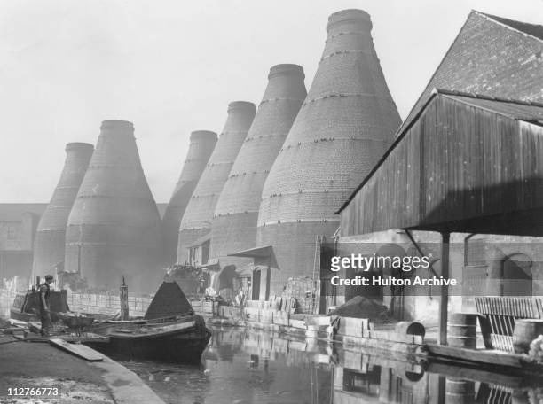 Firing kilns alongside the canal at Stoke-on-Trent, November 1948. It has been the capital of the Potteries since 1910 when the towns of Stoke,...