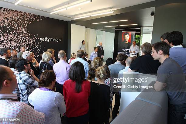 Senior Vice President, Editorial Imagery, Adrian Murrell addresses staff at the Getty Images London office prior to a minutes silence held in...