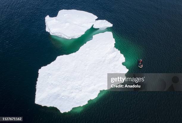 An aerial view of Sahika Ercumen, an internationally renowned Turkish diver, arriving with a zodiac boat for a free-diving training at icebergs near...