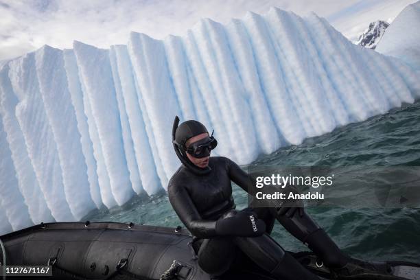 Sahika Ercumen, an internationally renowned Turkish diver, prepares for her free-diving training at the icebergs near Galindez Island in Antarctica...