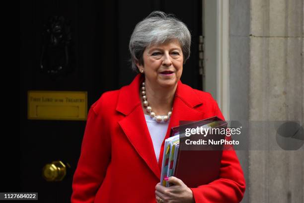 Britain's Prime Minister Theresa May leaves 10 Downing street to attend the weekly Prime Ministers Questions in the Houses of Parliament in London on...