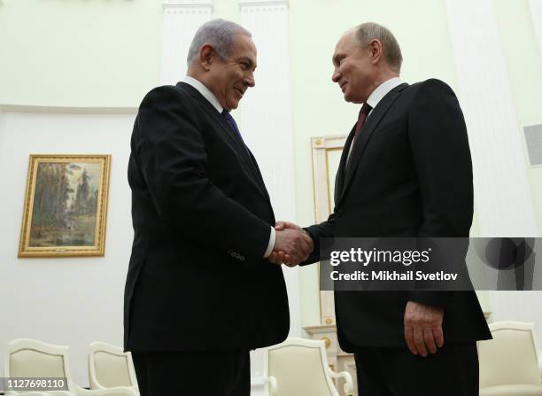 Russian President Vladimir Putin greets Israeli Prime Minister Benjamin Netanyahu during their talks at the Kremlin on February 27, 2019 in Moscow,...