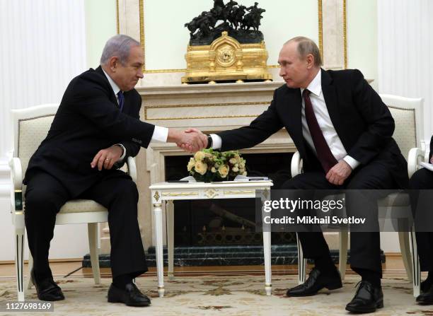 Russian President Vladimir Putin greets Israeli Prime Minister Benjamin Netanyahu during their talks at the Kremlin on February 27, 2019 in Moscow,...