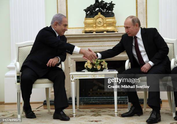 Russian President Vladimir Putin greets Israeli Prime Minister Benjamin Netanyahu during their talks at the Kremlin on February 27, 2019 in Moscow,...