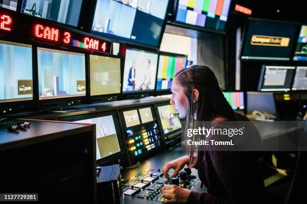 student using tv studio equipment - broadcasted stock pictures, royalty-free photos & images