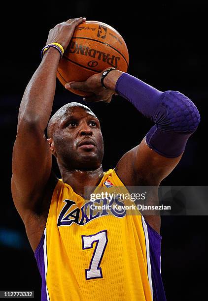 Lamar Odom of the Los Angeles Lakers shoots a free throw while taking on the New Orleans Hornets in Game Two of the Western Conference Quarterfinals...