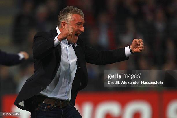 Mirko Slomka, head coach of Hannover celebrates his first team goal during the Bundesliga match between SC Freiburg and Hannover 96 at Badenova...