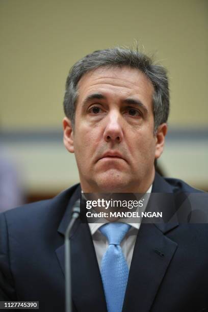 Michael Cohen, US President Donald Trump's former personal attorney, arrives to testify before the House Oversight and Reform Committee in the...