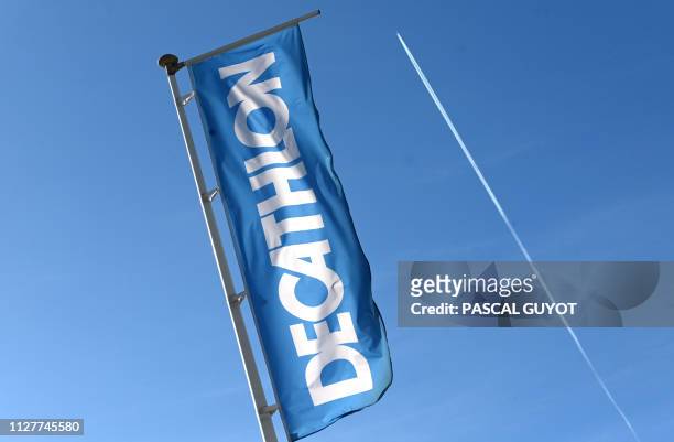Picture taken on February 27 shows the logo at a store of French sports goods retailer Decathlon in Montpellier, southern France. - French sports...